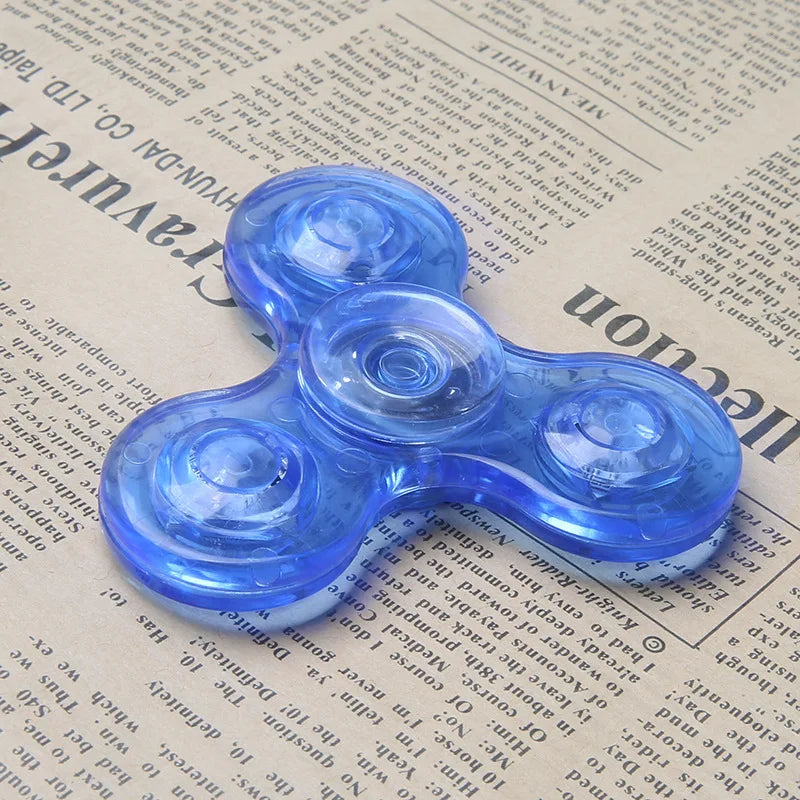 Fidget Spinner de mano con luz LED luminosa de cristal que brilla en la oscuridad, juguetes EDC para aliviar el estrés, giroscopio cinético para niños.