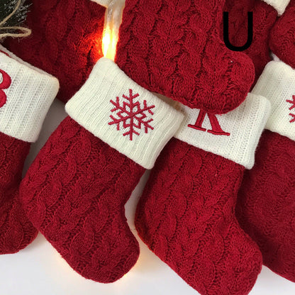 Bolsa de regalo con colgante de lana tejida con letras navideñas